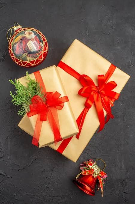 Personalised Gifts laying on black table cloth